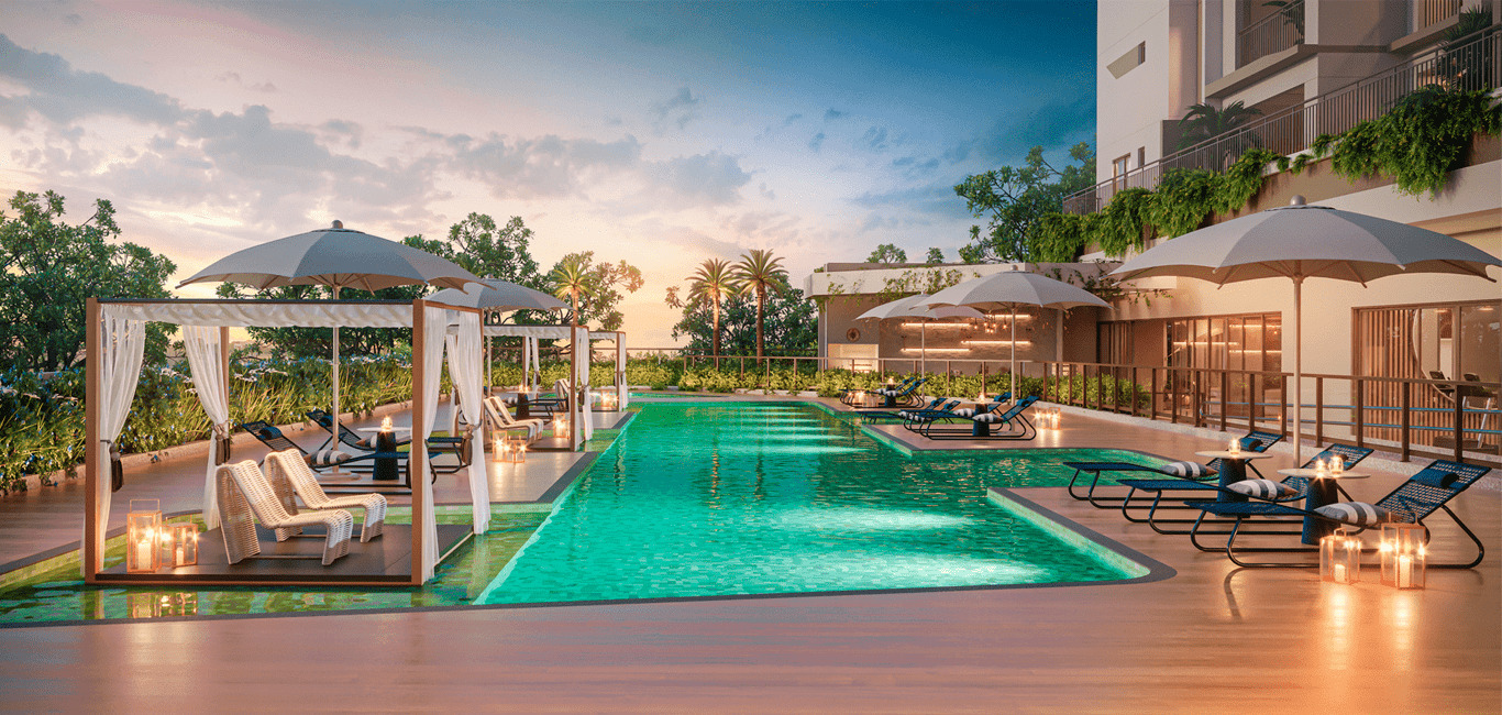 Uma área de piscina externa luxuosa durante o pôr do sol, com uma piscina impecável cercada por cadeiras confortáveis, cabanas elegantes e iluminação bem colocada para criar uma atmosfera serena.